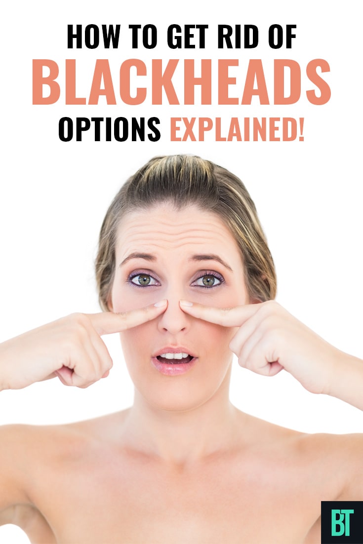 Beautiful woman squeezing blackeads on her nose.