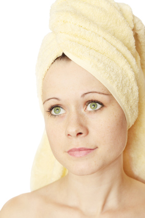 Beautiful Women with a towel over her head