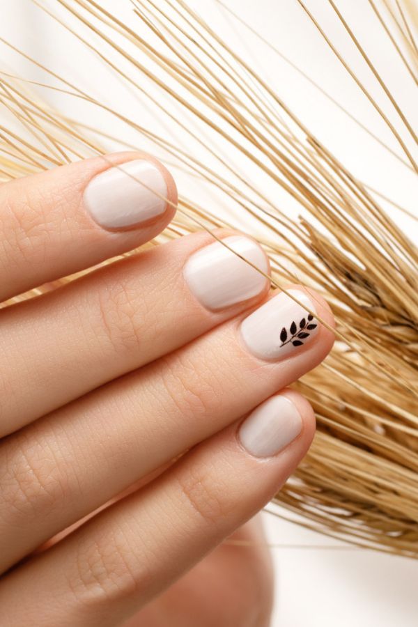 Neutral Elegance with a Hint of Nature Nails
